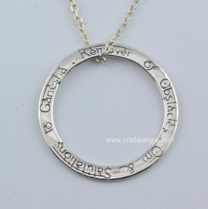 Silver necklace with mantra in mandala; om & salutations to Ganesh