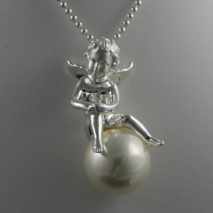 Discover our angel pendant on a long necklace in silver as well as all our guardian angel jewellery in metal, silver or semi precious stones.