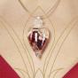 Discover the healing power of stones with this garnet, red semi precious stone and rock crystal pendant