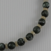 Dicover the power of gemstones with this seraphinite necklace, green stone and calcite, yellow stone